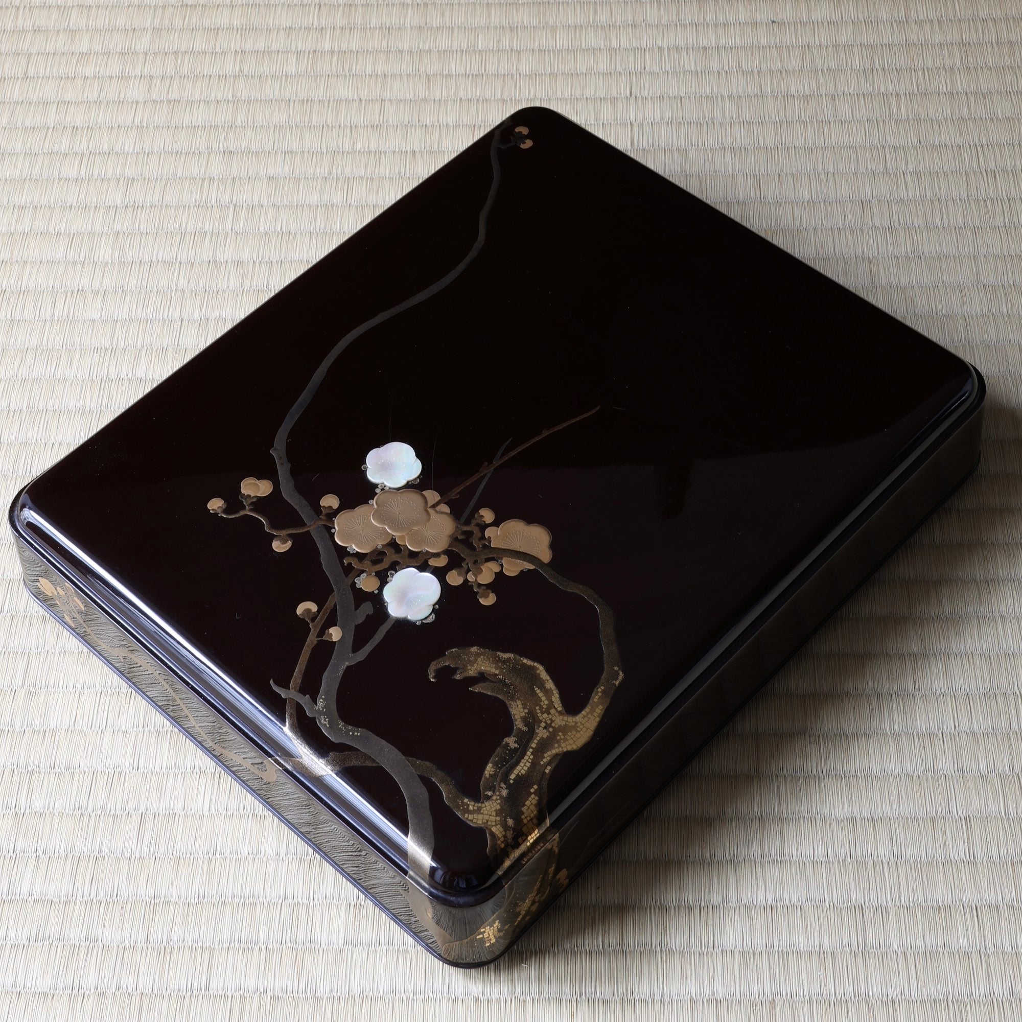 Imperial urushi lacquer, gold and mother-of-pearl suzuribako (Japanese writing box), with ume (plum blossom) decoration