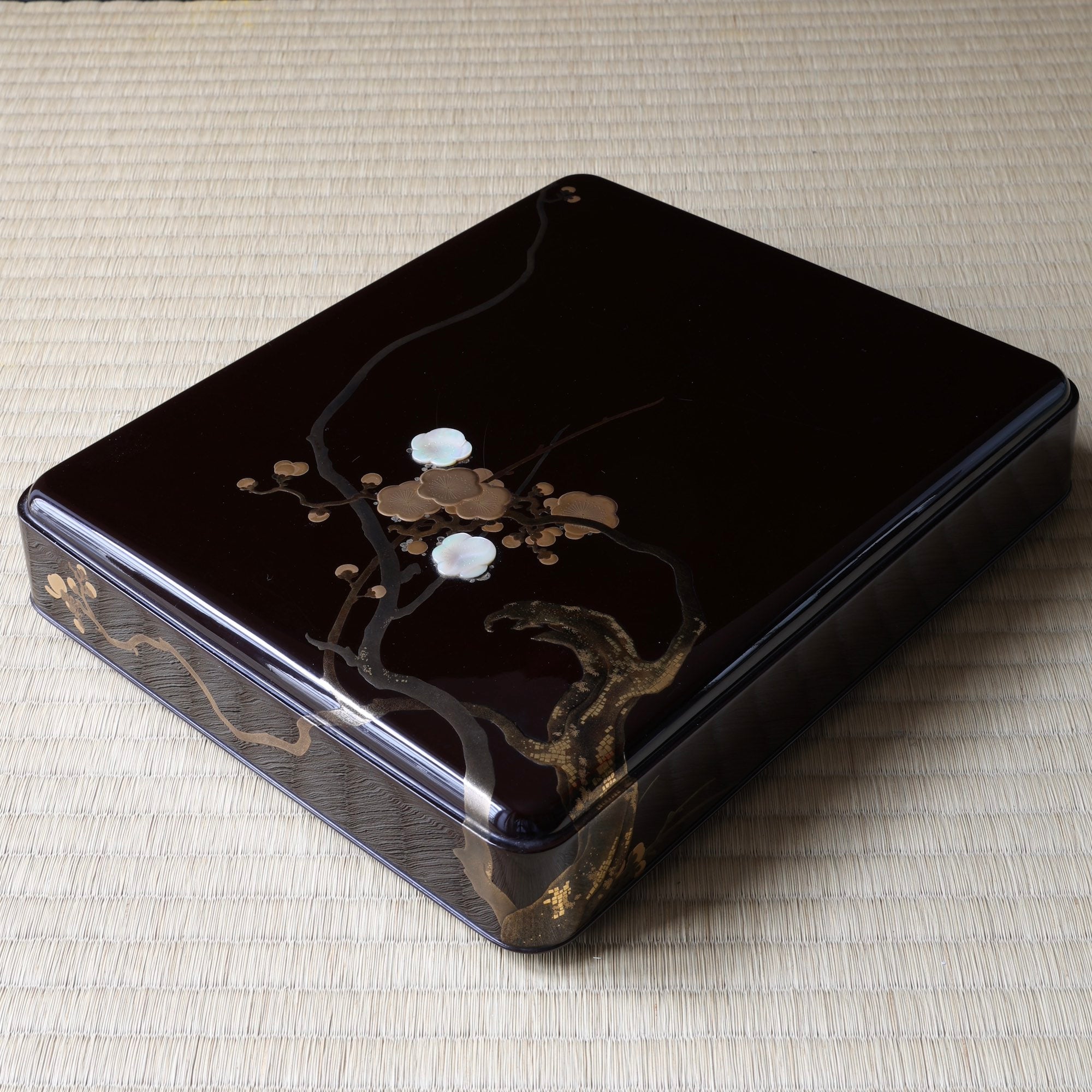Imperial urushi lacquer, gold and mother-of-pearl suzuribako (Japanese writing box), with ume (plum blossom) decoration