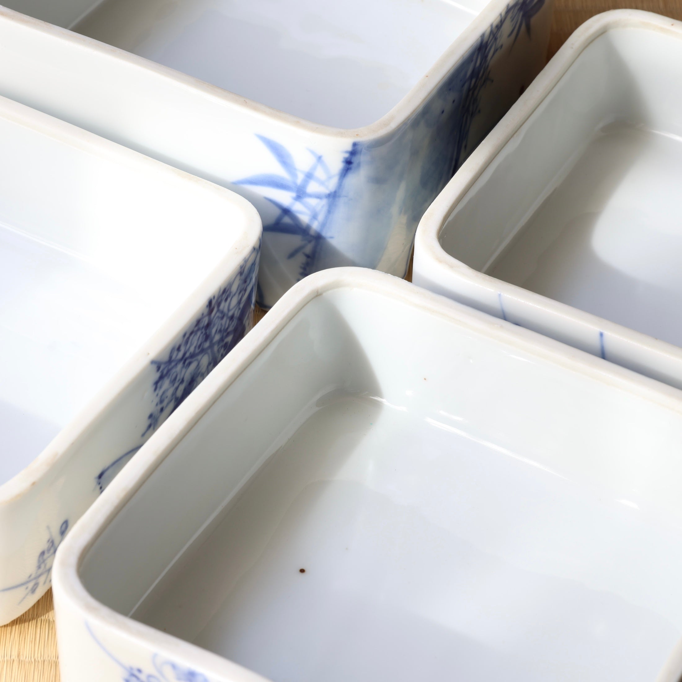 Jubako (stackable boxes) in sometsuke (underglaze blue) porcelain, with bird and plum blossom decoration, Meiji era