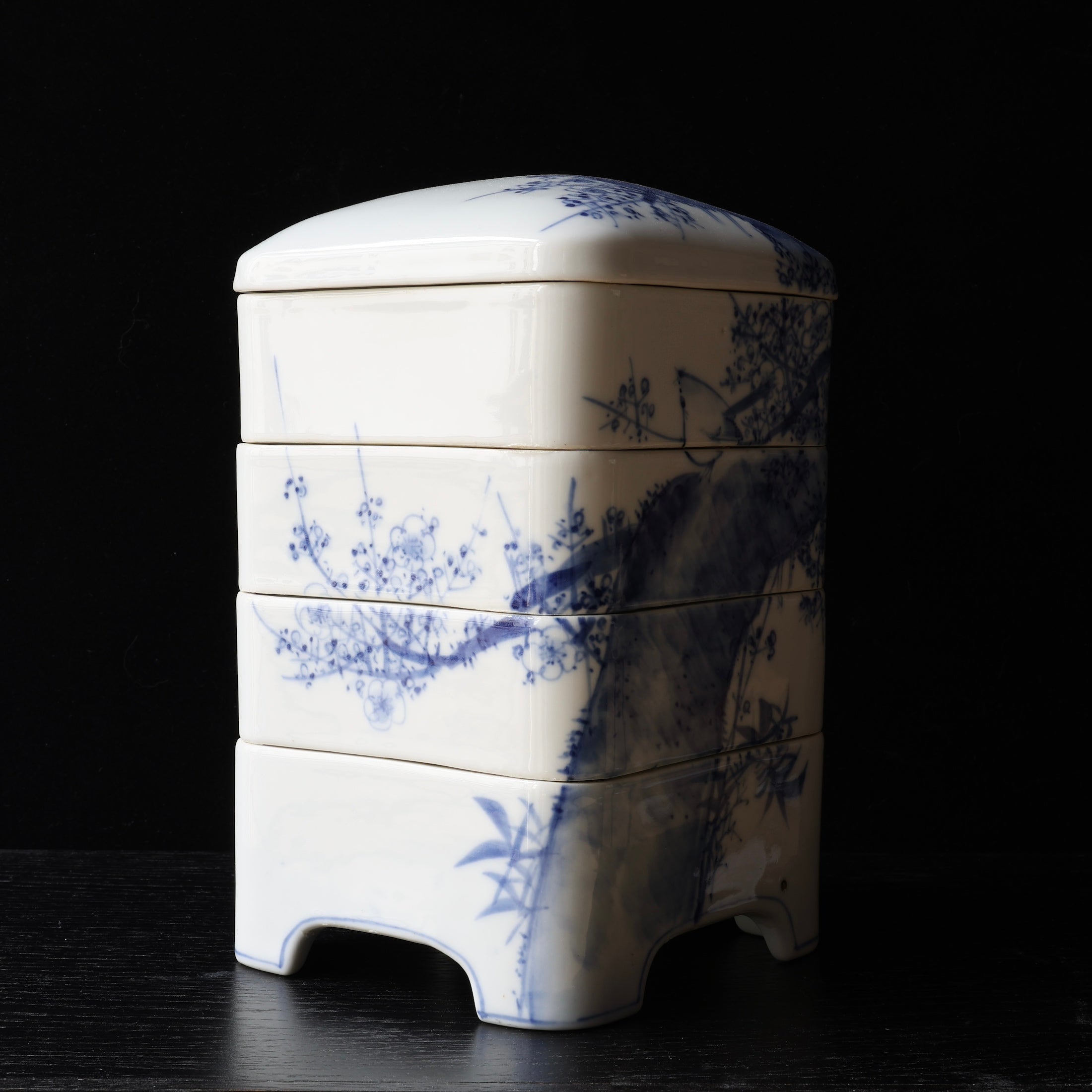 Jubako (stackable boxes) in sometsuke (underglaze blue) porcelain, with bird and plum blossom decoration, Meiji era