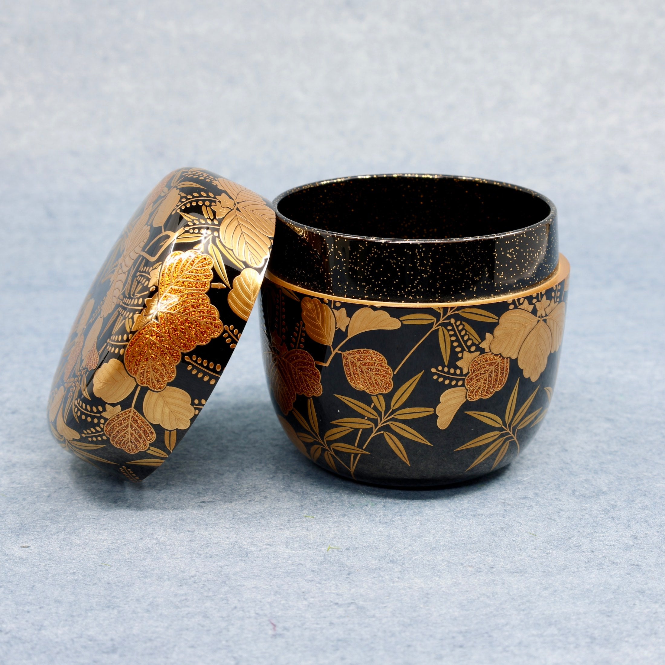 Natsume (Japanese tea caddy) lacquered and gilded, kirichiku (paulownia and bamboo) decoration by Kōsen Ōshita