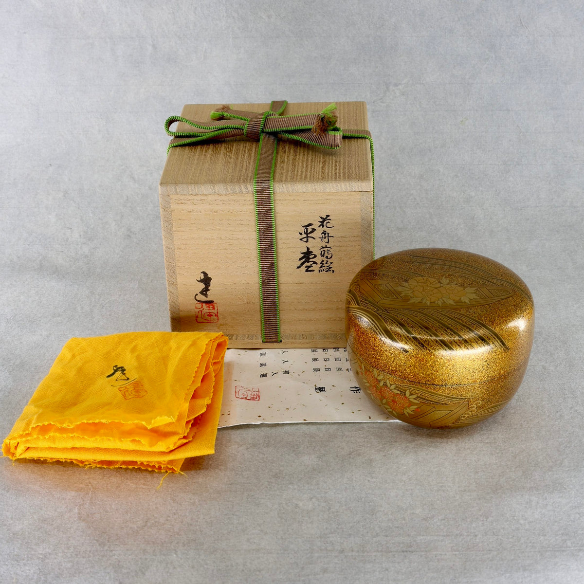 Natsume (Japanese tea caddy) lacquer and gold, hanaikada (flower rafts) design by Ken Matsumura