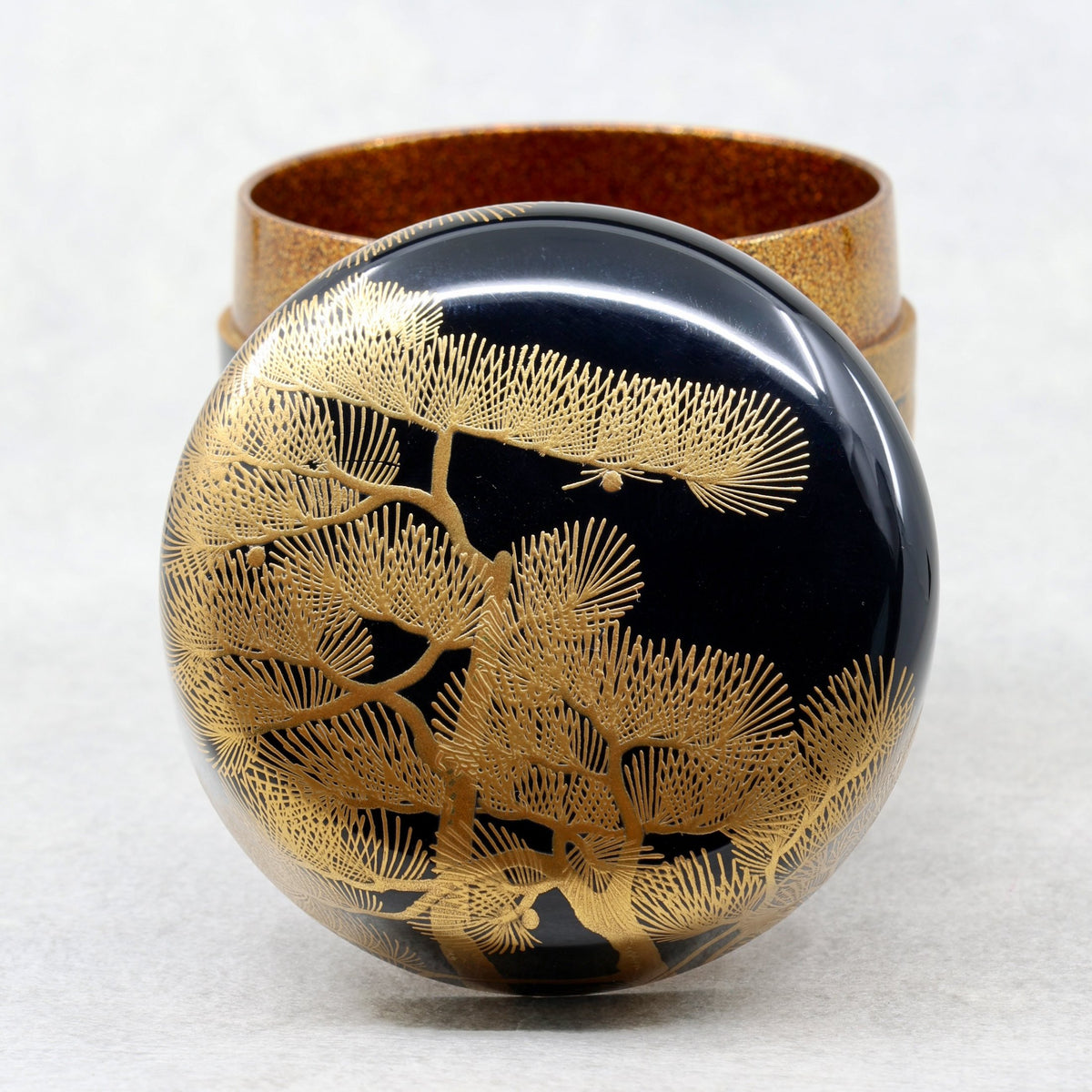 Natsume (Japanese tea caddy) in lacquer and gold, with a matsu (pine) design by Ikkō Kiyose