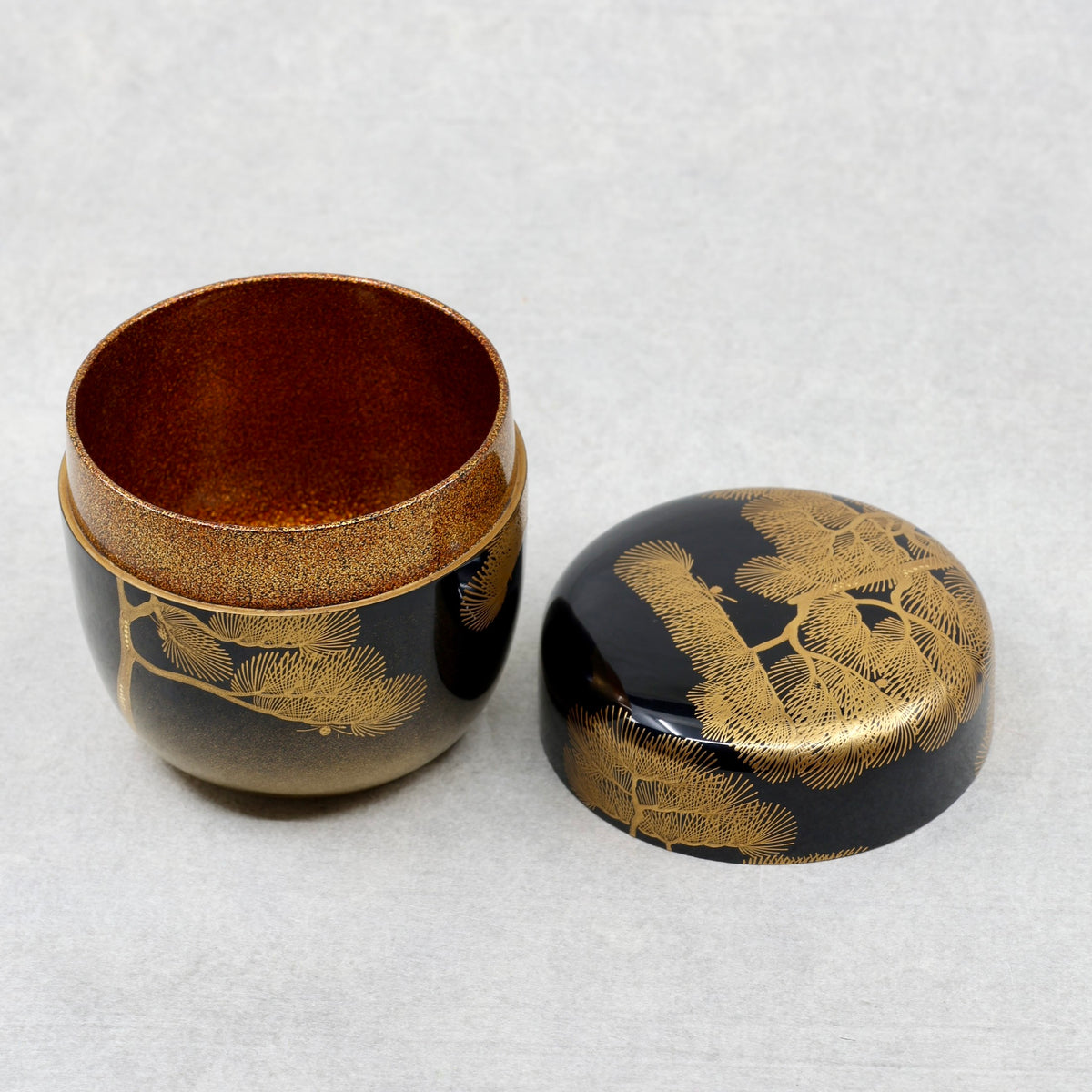 Natsume (Japanese tea caddy) in lacquer and gold, with a matsu (pine) design by Ikkō Kiyose