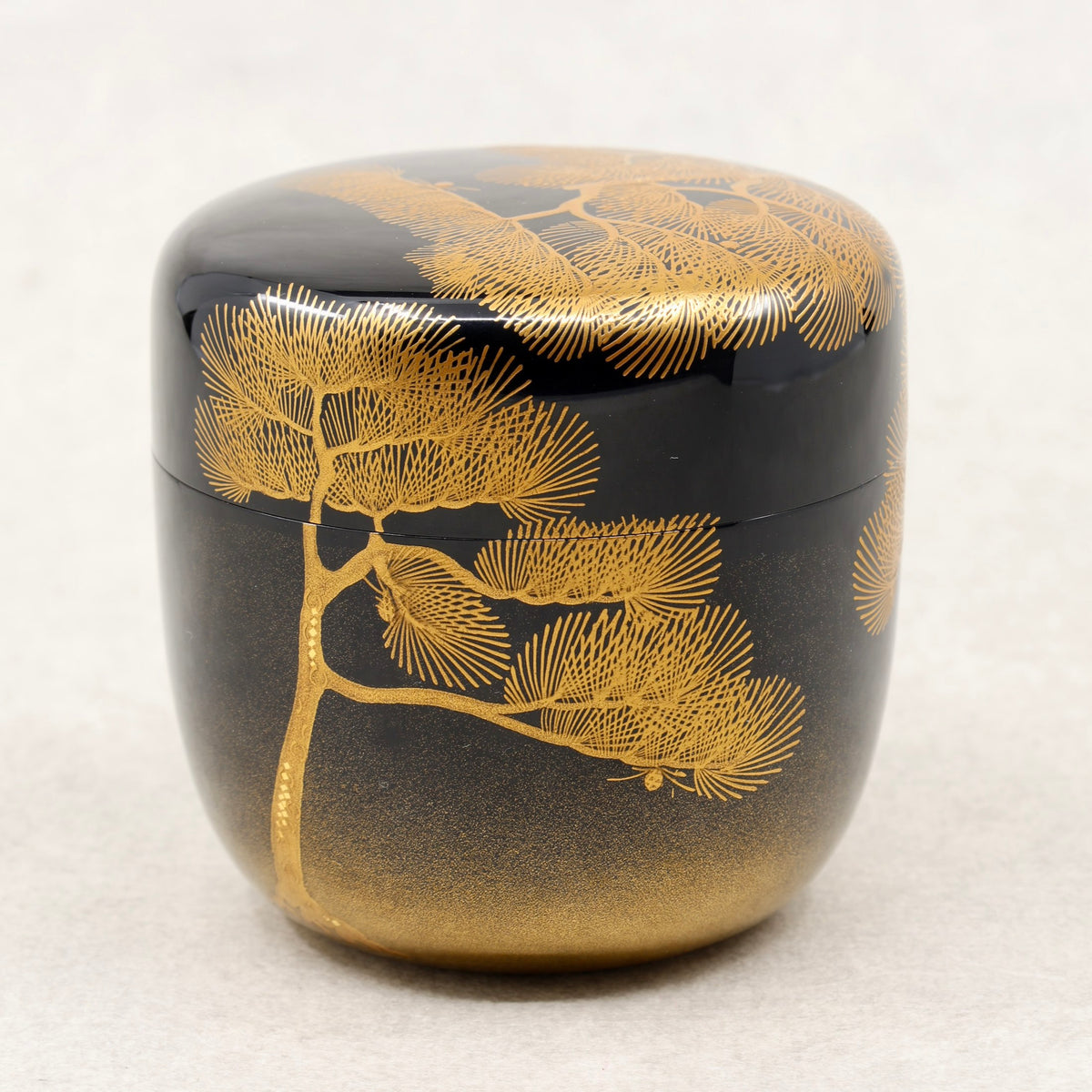 Natsume (Japanese tea caddy) in lacquer and gold, with a matsu (pine) design by Ikkō Kiyose
