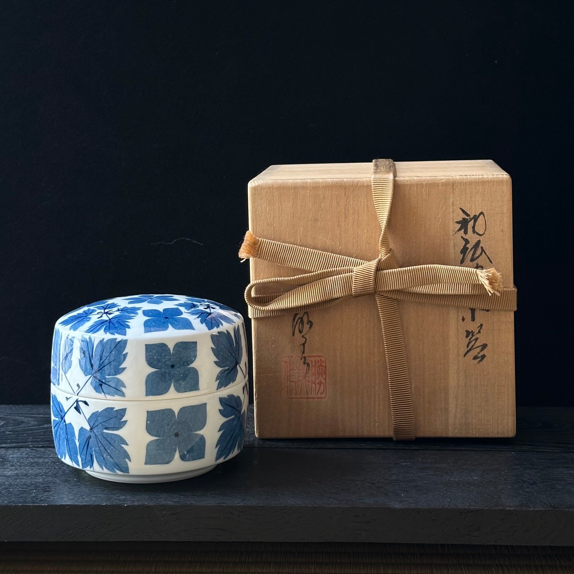 White porcelain box with washi zome flower and leaf decoration by Katsumi Eguchi