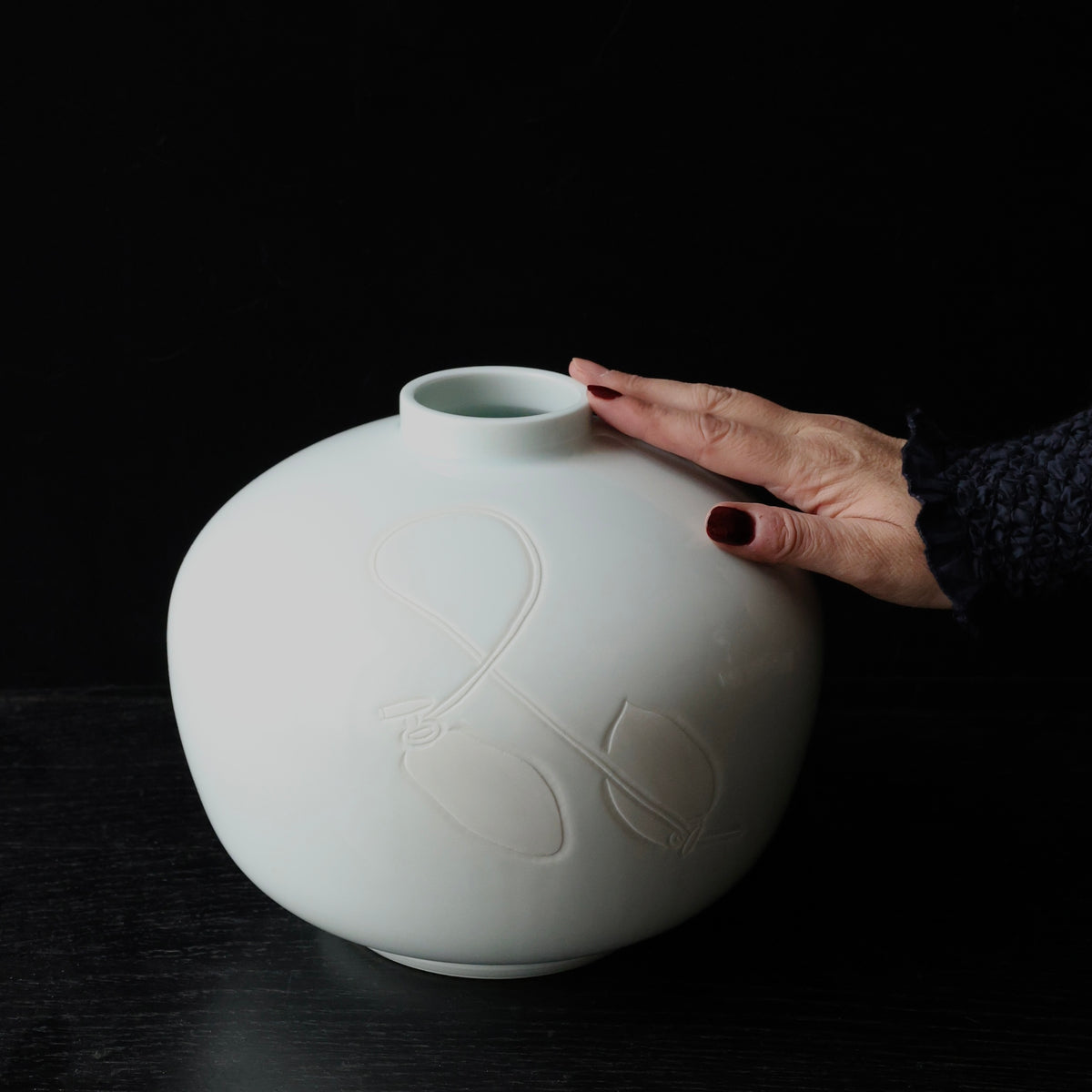 Seihakuji celadon porcelain vase with persimmons by Manji Inoue, Living National Treasure