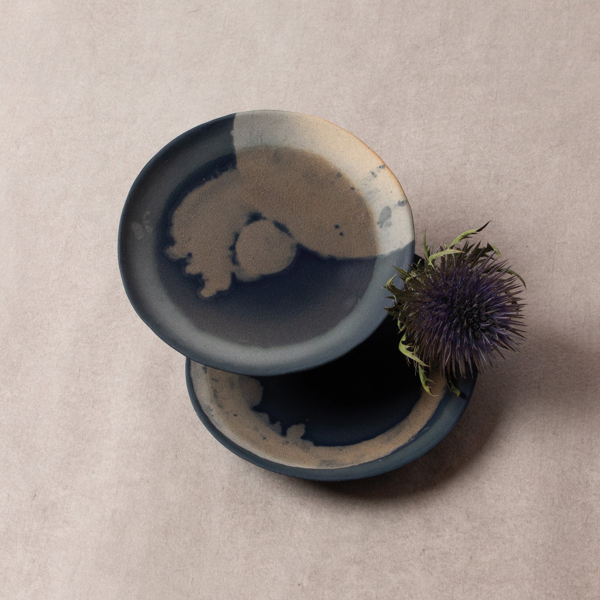 Blue and beige footed porcelain plate by Yuna Saito 