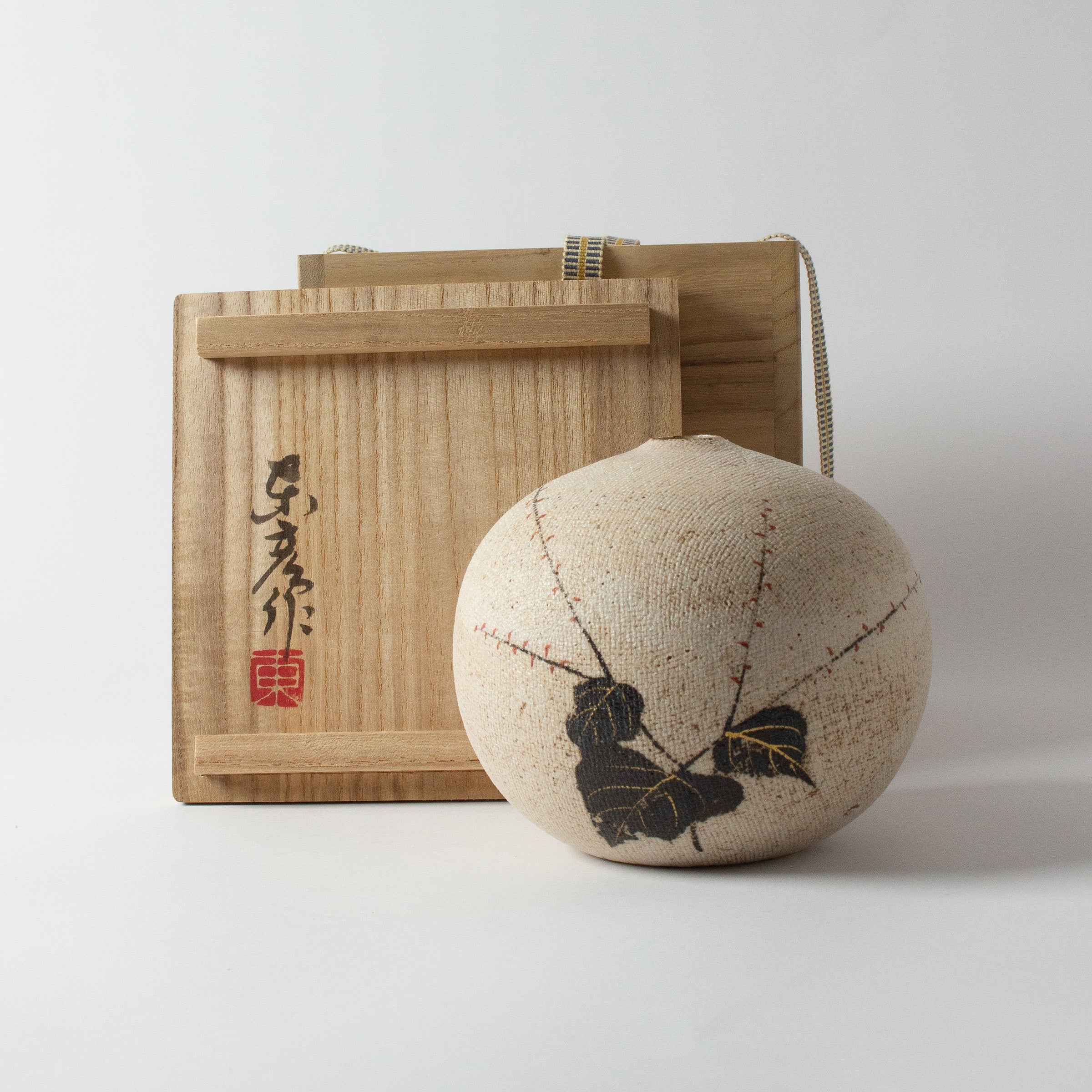 Vine vase by Motohiko Ito