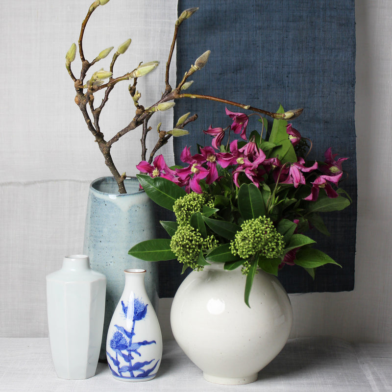 Set of 2 small white ceramic Japanese vases with blue flowers