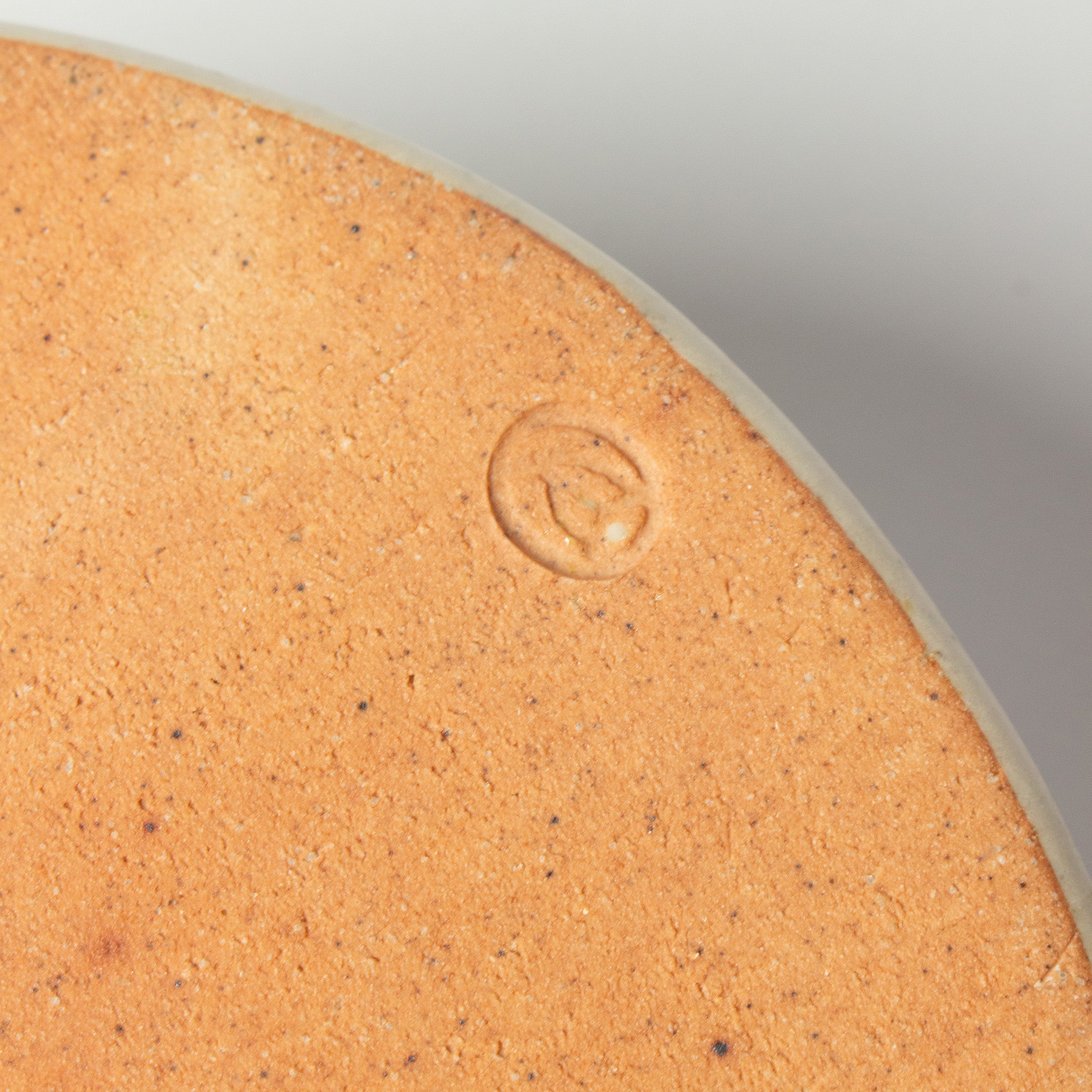 Japanese ceramic box with camellia motif by Seigō Maeda