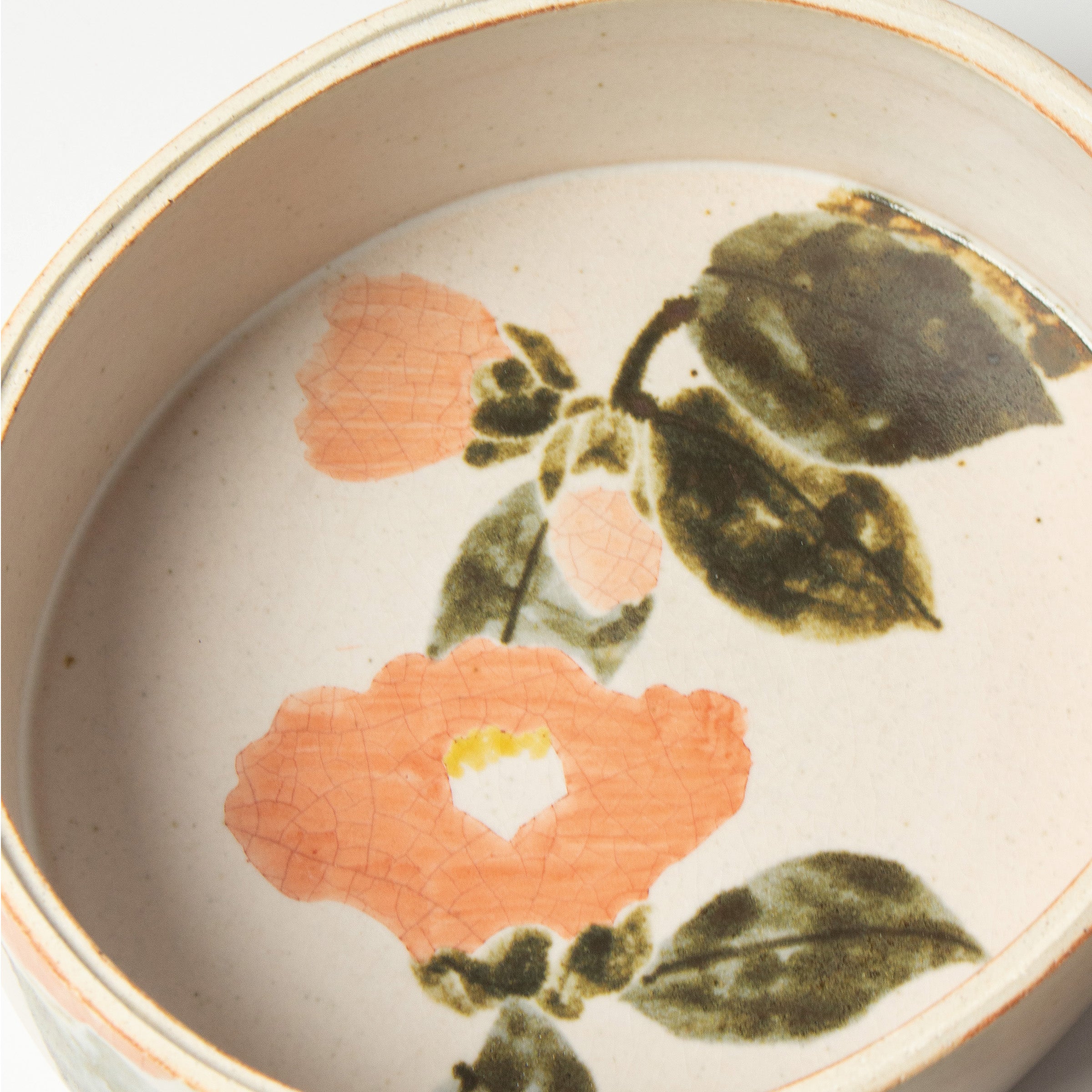 Japanese ceramic box with camellia motif by Seigō Maeda