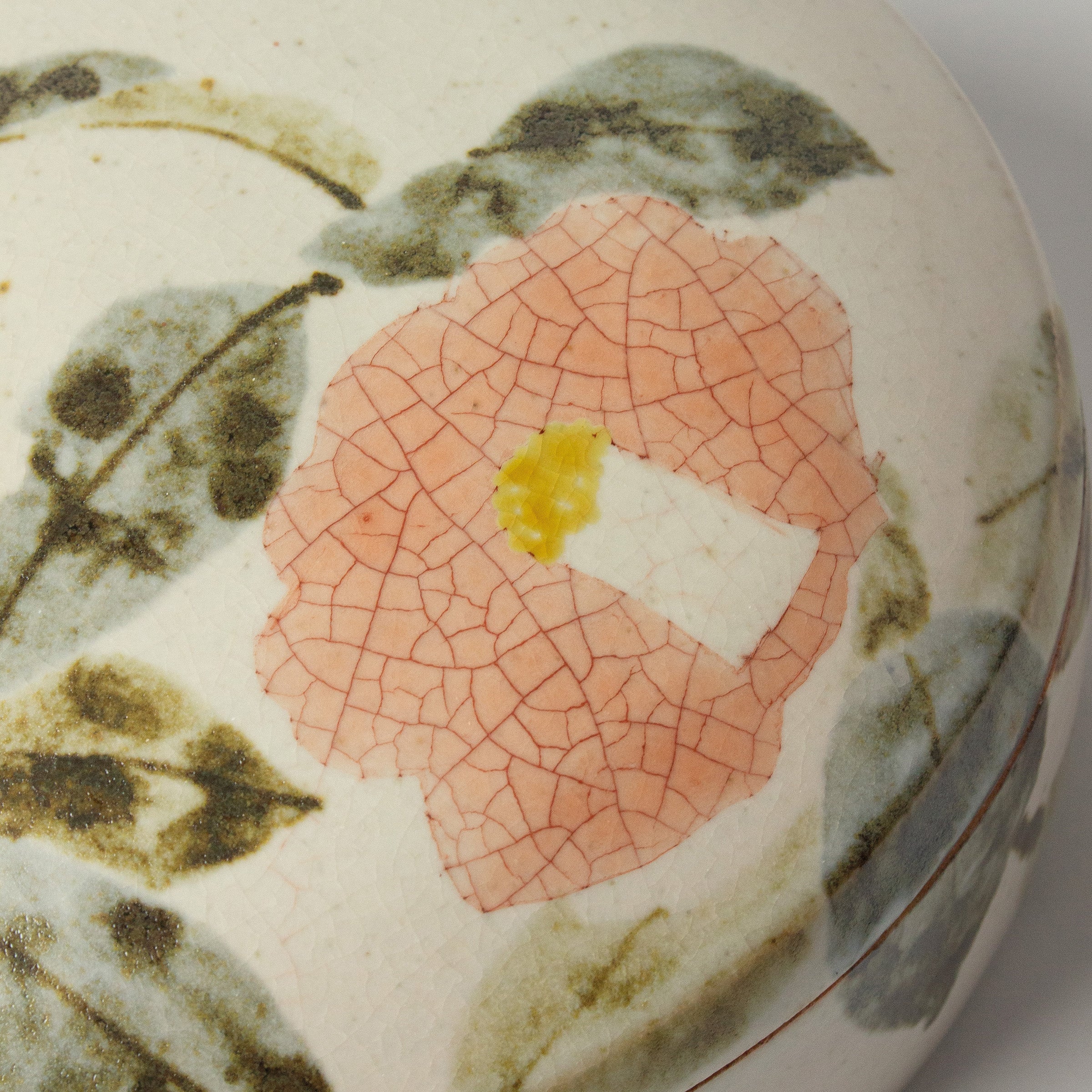 Japanese ceramic box with camellia motif by Seigō Maeda