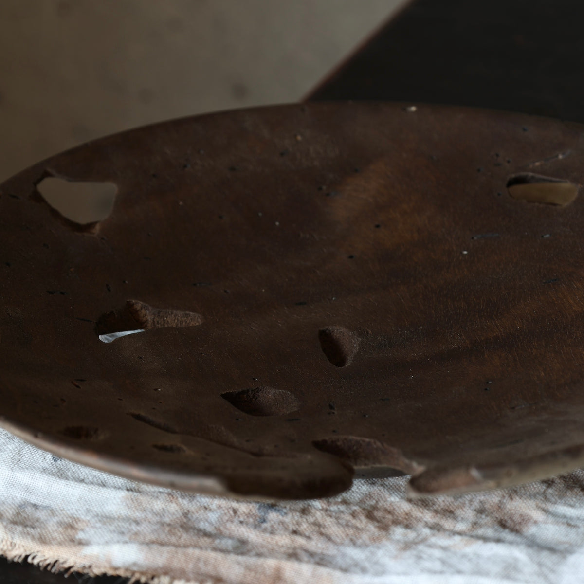 Kaki plate (Japanese raku) with tetsuzome (iron mordant) finish by Masahito Ikeda