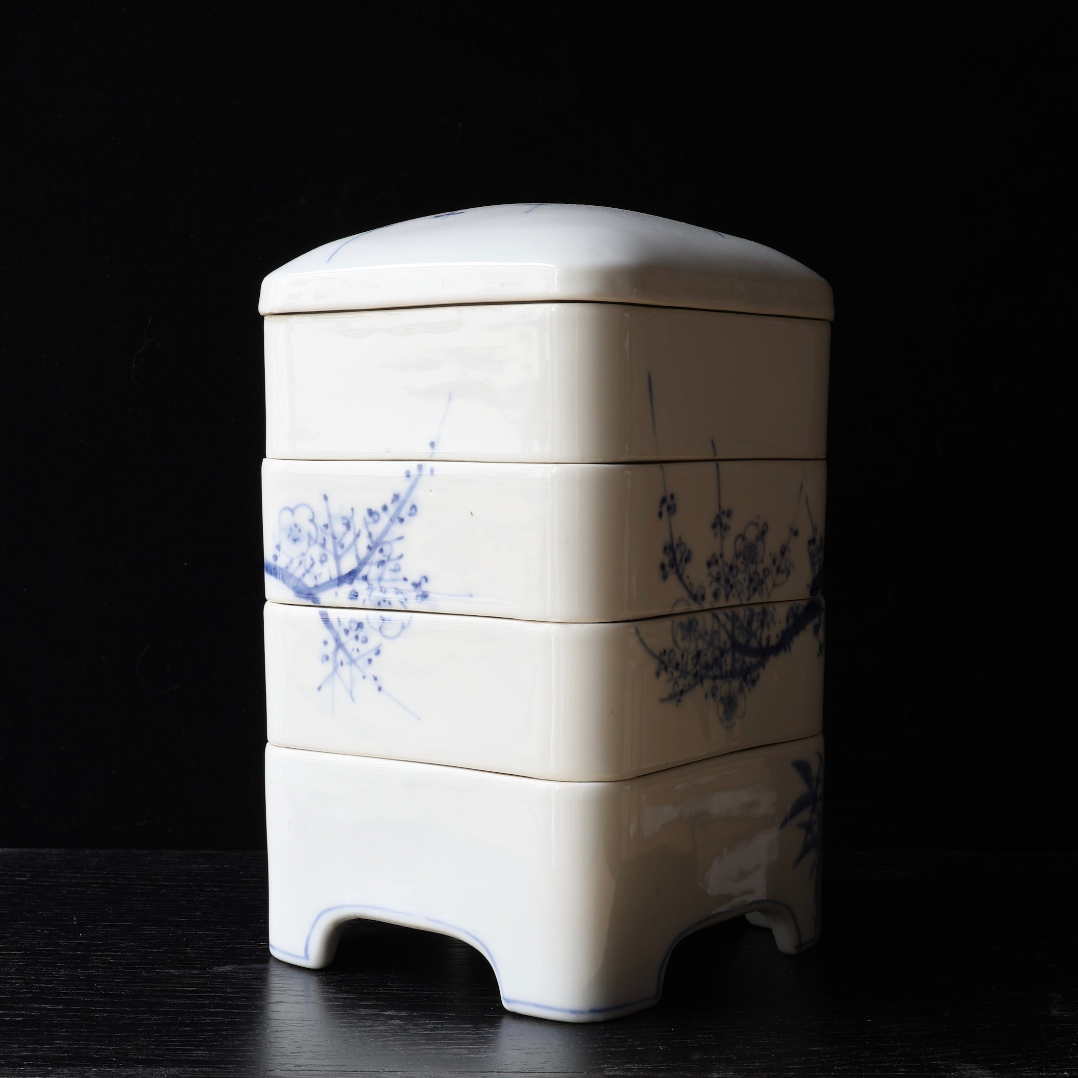 Jubako (stackable boxes) in sometsuke (underglaze blue) porcelain, with bird and plum blossom decoration, Meiji era