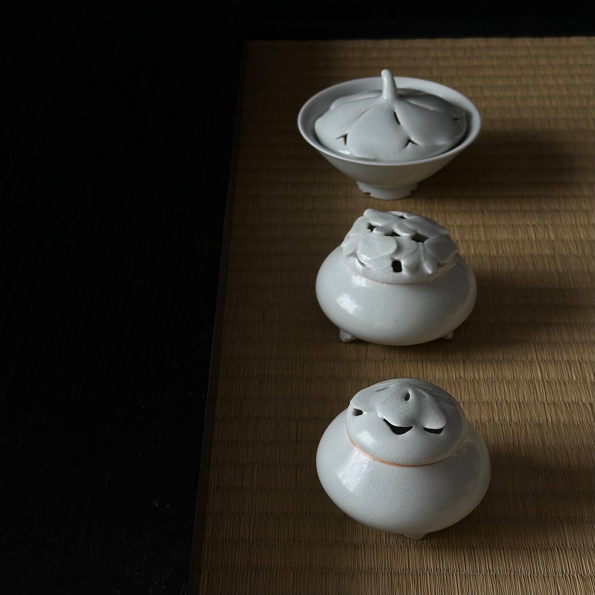 White porcelain incense holder with butterfly motif by Kyunghee Shin