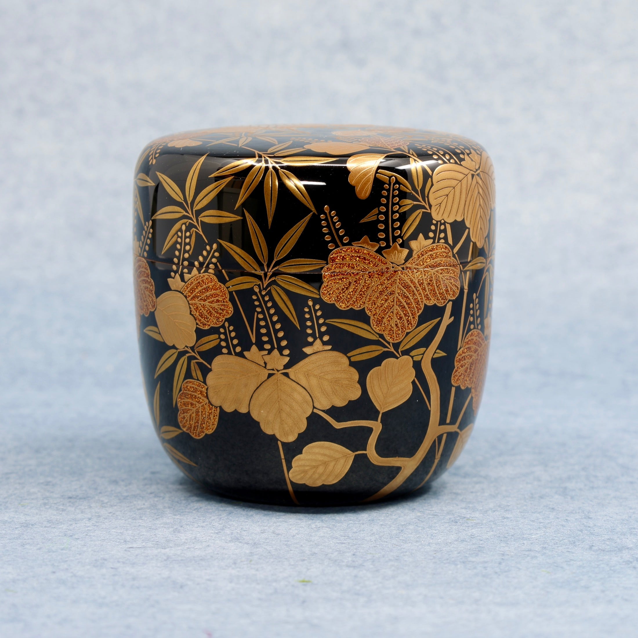 Natsume (Japanese tea caddy) lacquered and gilded, kirichiku (paulownia and bamboo) decoration by Kōsen Ōshita