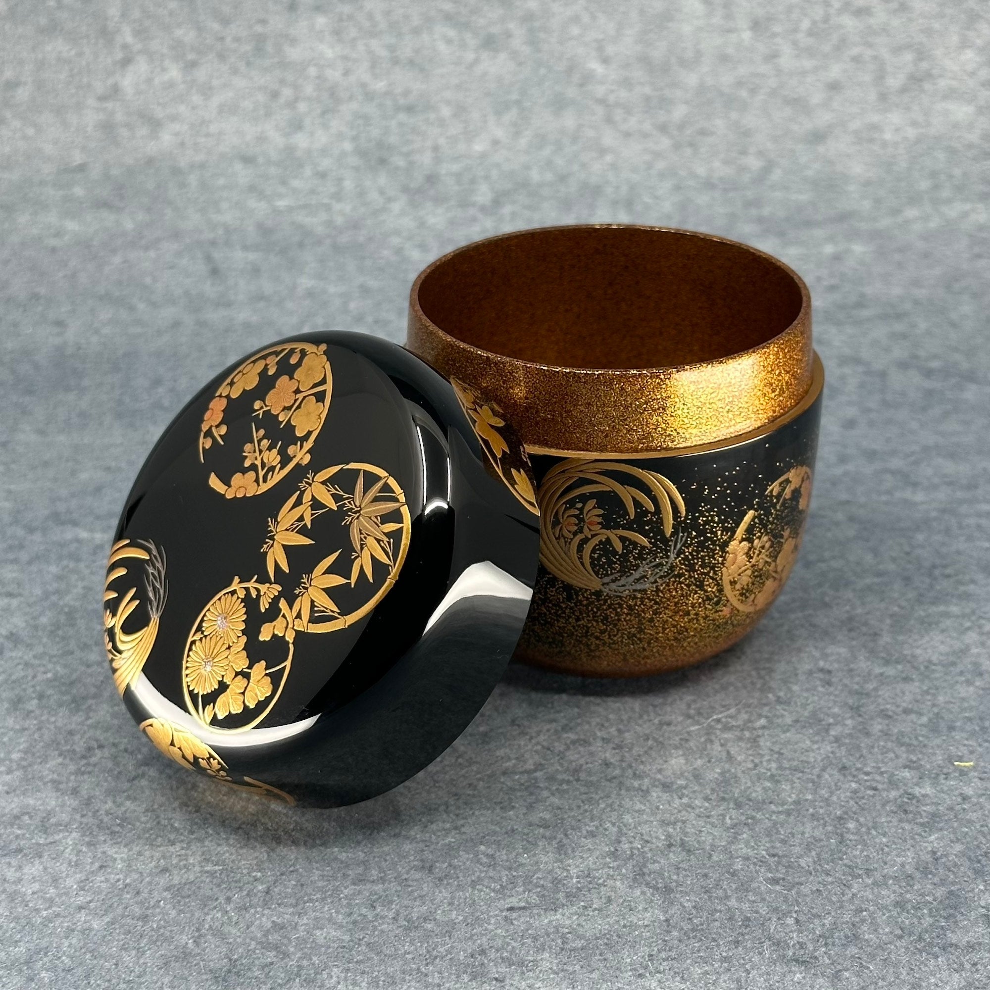 Natsume (Japanese tea caddy) lacquered and gilded, shikunshi (four gentlemen) decoration in circles by Shōetsu Watanabe