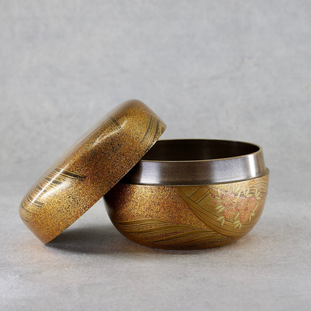 Natsume (Japanese tea caddy) lacquer and gold, hanaikada (flower rafts) design by Ken Matsumura