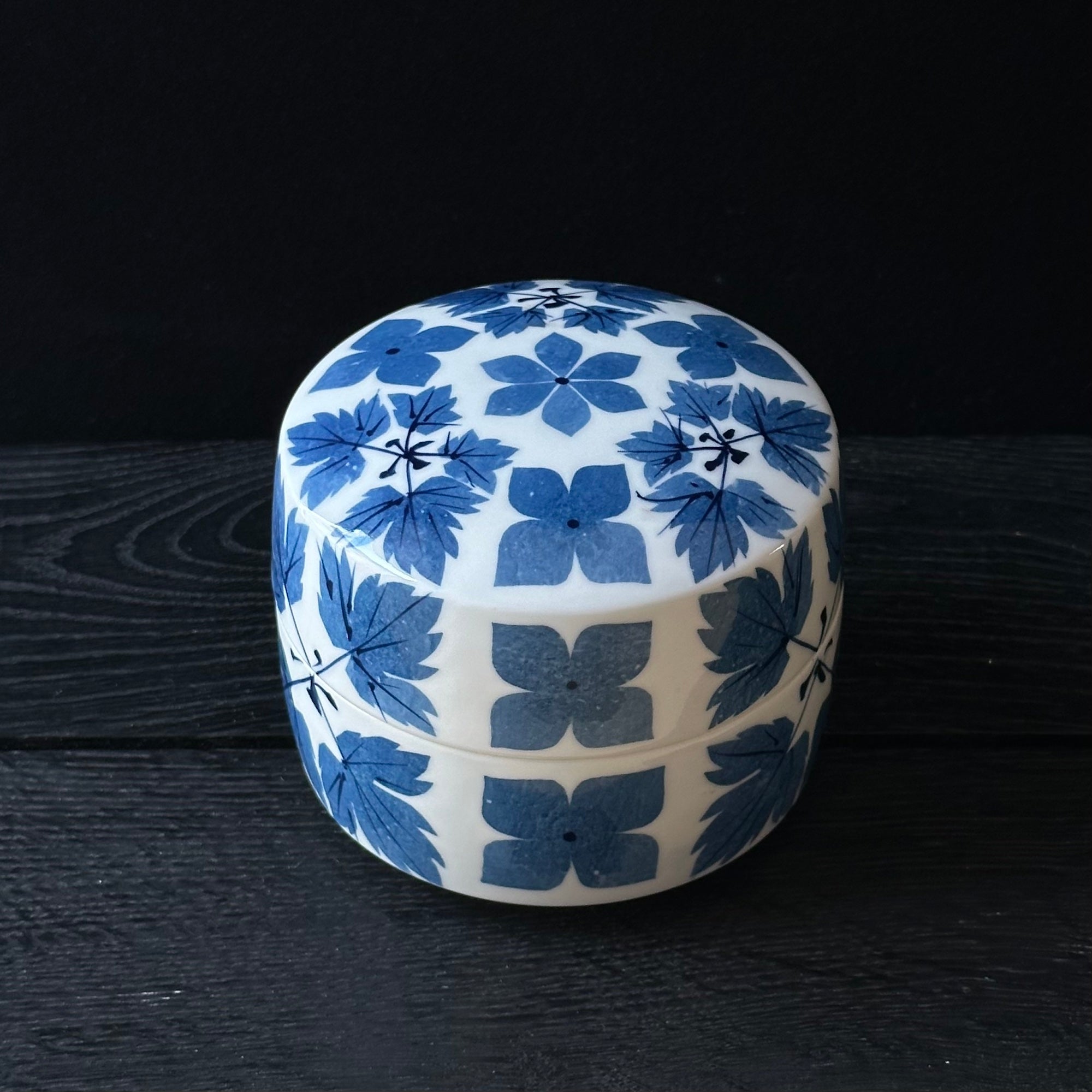 White porcelain box with washi zome flower and leaf decoration by Katsumi Eguchi