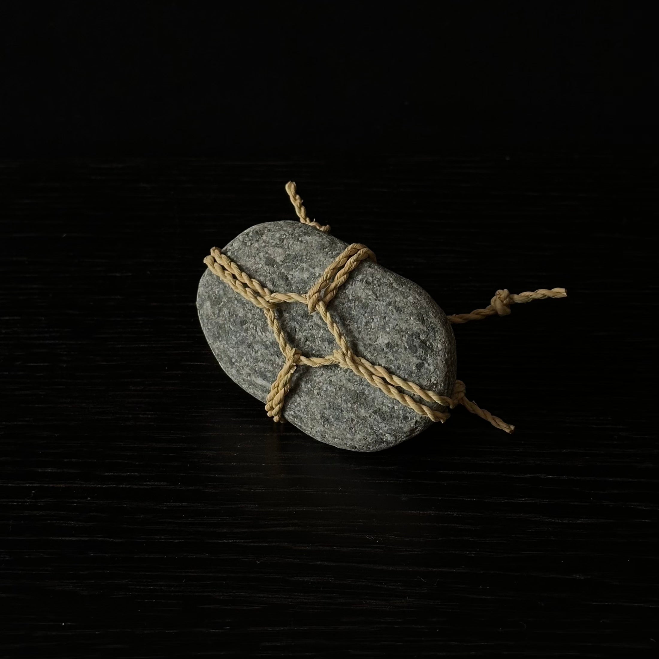 Sekimori #9, stone and rice straw rope (wara)