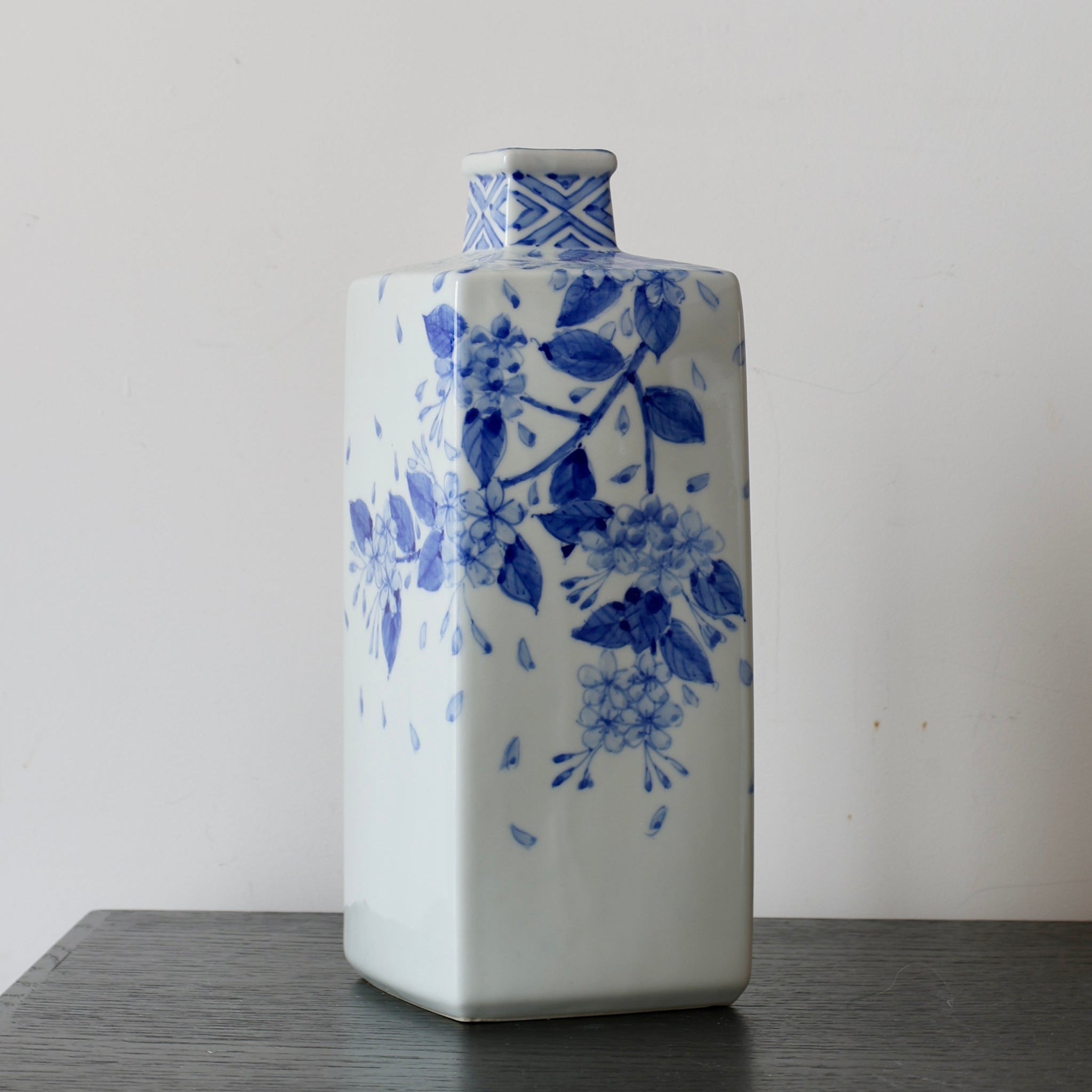 Vintage Arita blue and white porcelain vase, plum blossom decoration