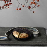 Small black urushi lacquer and maki-e box, cho ni fuji (butterfly and wisteria) motif